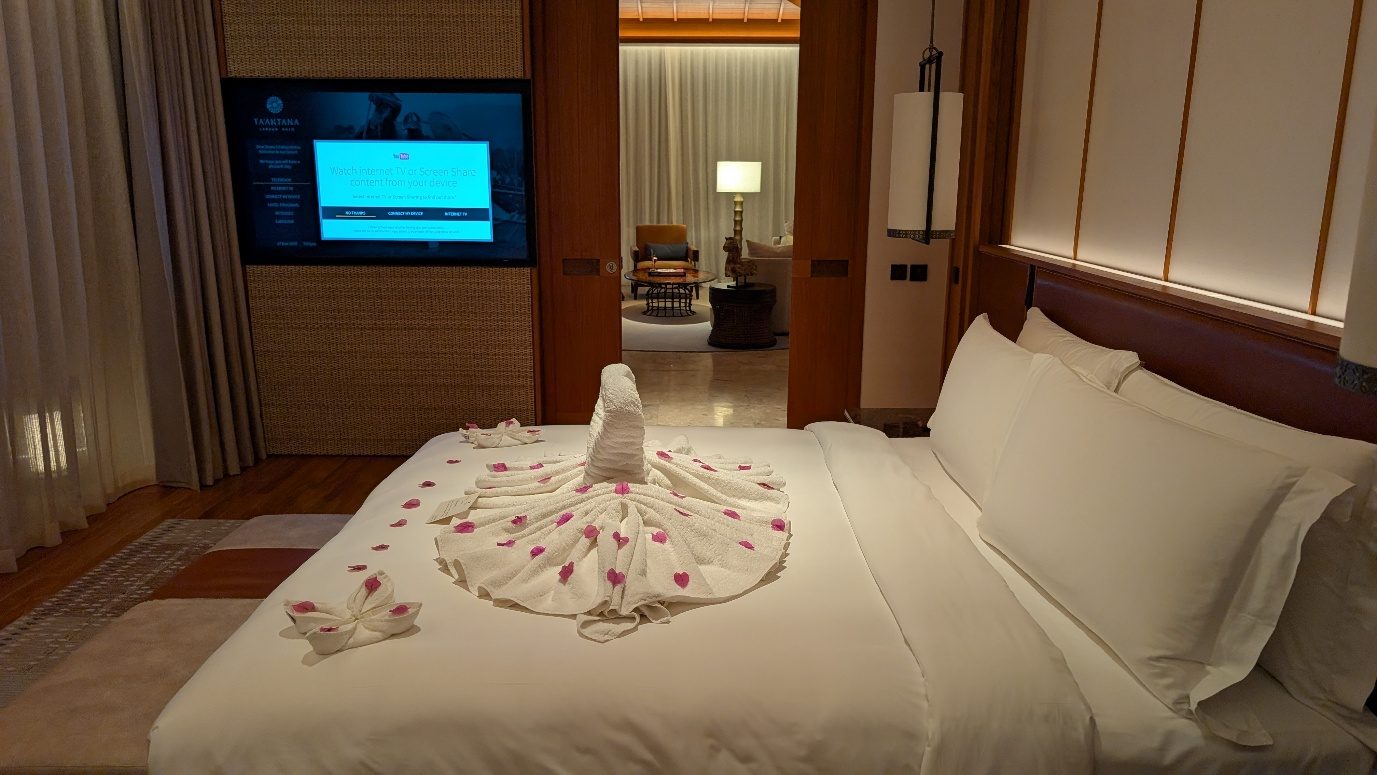 Bedroom with a towel swan